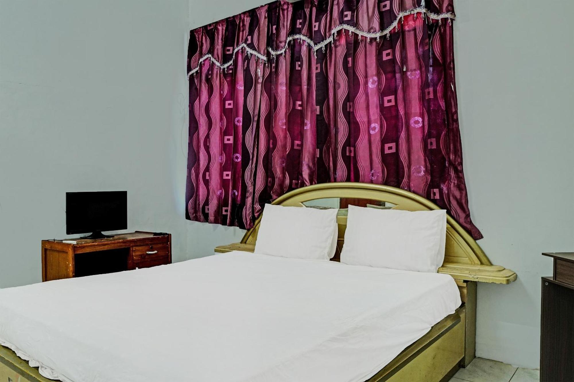 Spot On 92196 Kost Axcel Hotel